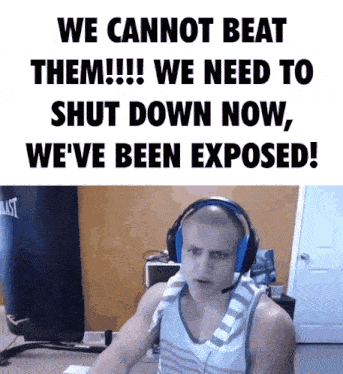 a man wearing headphones is sitting in front of a sign that says " we cannot beat them "