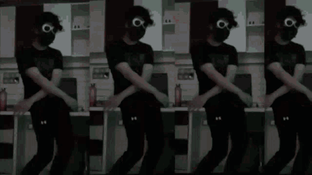 a man in a mask is dancing in a room