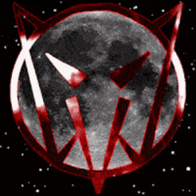 a picture of a full moon with a devil 's face in the center