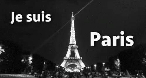 a black and white photo of the eiffel tower with the words je suis paris above it