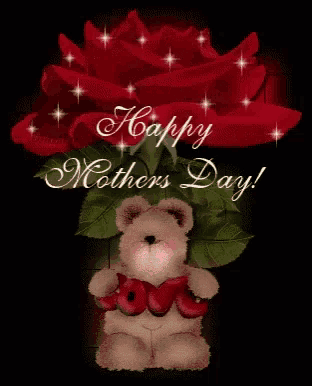 a teddy bear holding a red heart that says love