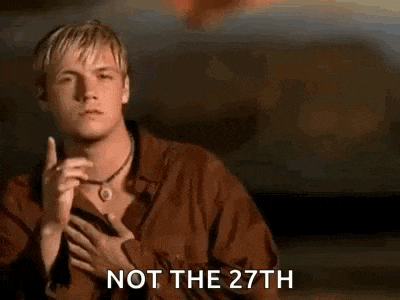 a man in a brown shirt is making a gesture with his finger to his mouth and says `` not the 27th '' .