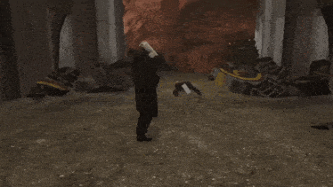 a man in a suit and tie is holding a gun in a video game