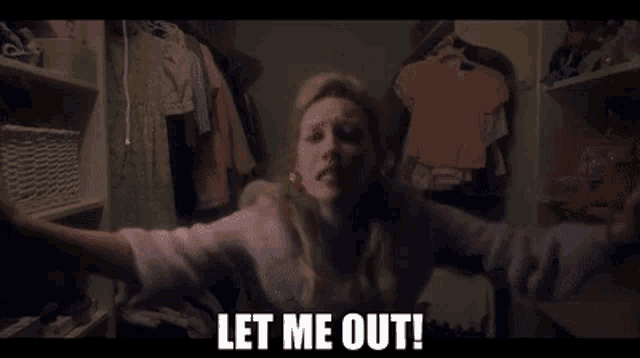 a woman is in a closet with her arms outstretched and the words let me out above her .