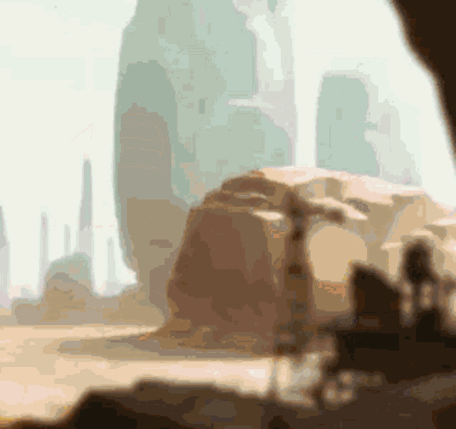 a painting of a desert landscape with mountains in the background .