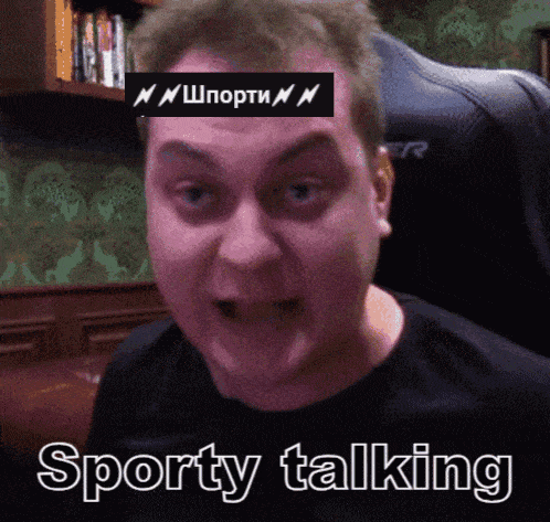 a man with the word sporty talking on his head