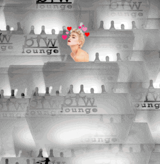 a woman with hearts in her hair stands in front of a row of bw lounge boxes