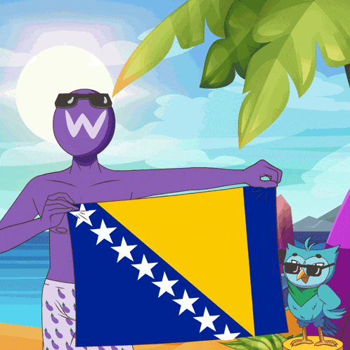 a man with a w on his head is holding a flag on a beach