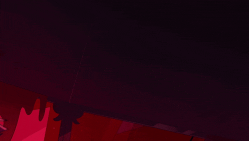 a close up of a cartoon character 's mouth with a dark background .