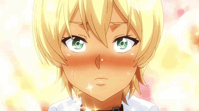 a girl with blonde hair and green eyes is making a silly face
