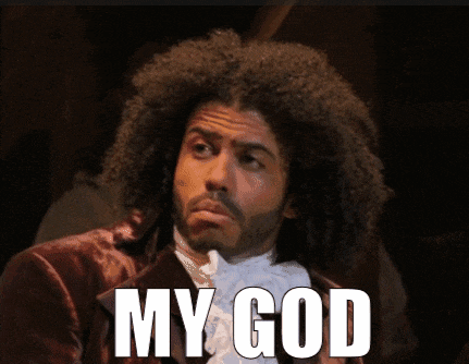 a man with curly hair and a beard has the words my god on his face
