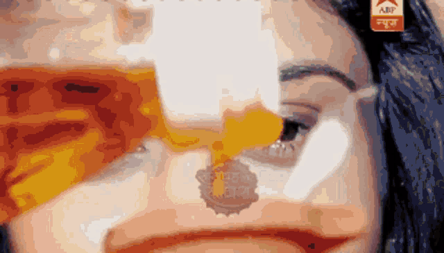 a close up of a woman 's face with an amf logo on the bottom