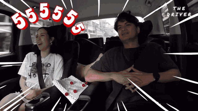 a man and a woman are sitting in the back seat of a car with the numbers 5555