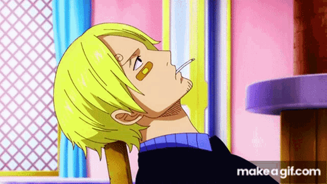 a man with a cigarette in his mouth is laying down on a chair .