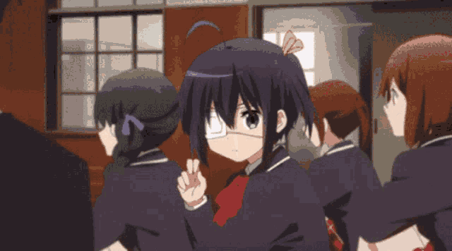 a group of anime girls are standing in a room
