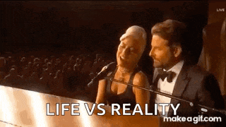 a man and a woman are standing next to each other at a piano .
