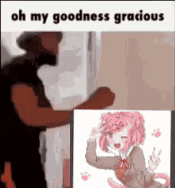 a man is standing next to a picture of a girl with pink hair and a cat tail .