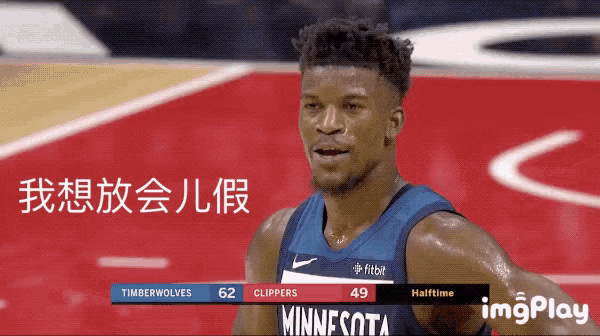 a basketball player for the minnesota timberwolves stands on the court
