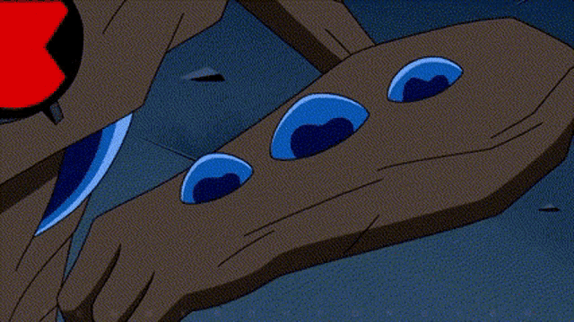 a close up of a cartoon character 's feet with blue circles on them