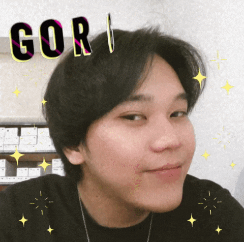 a young man with the word gor written on his head