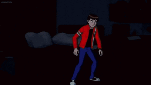 a person is standing in a dark room with a red light coming out of them .