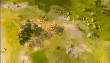 an aerial view of a lush green field with trees and flowers