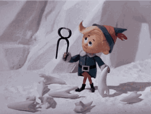 a cartoon elf is holding a candy cane