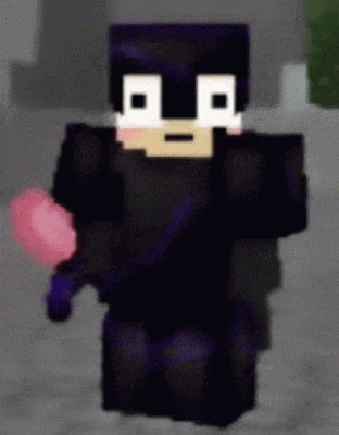 a close up of a minecraft character with a pink heart in his hand .