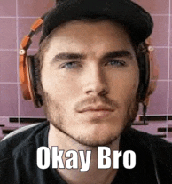 a man wearing headphones and a hat with the words `` okay bro '' written on his face .