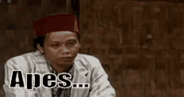 a woman wearing a red hat is sitting down with her hand on her forehead and the word apes written on the bottom .
