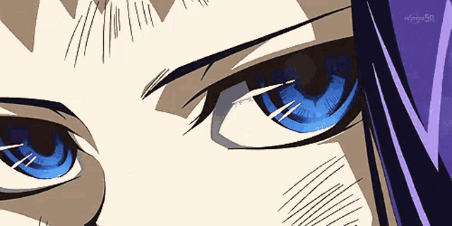 a close up of a person 's eyes with a purple background