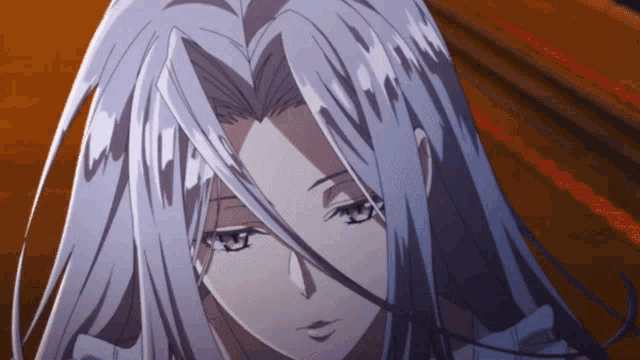 a close up of a person with long white hair