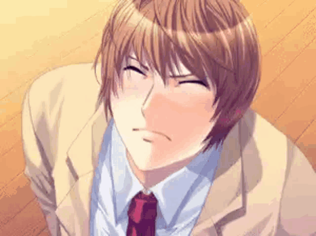 a man in a suit and tie is making a face .