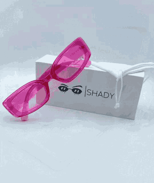 a pair of shady glasses in a box