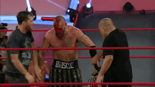 a man in a boxing ring with the word brissie on his shorts