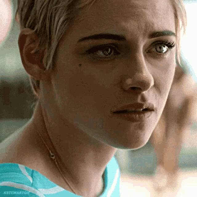 a close up of a woman 's face with the hashtag stewartgif