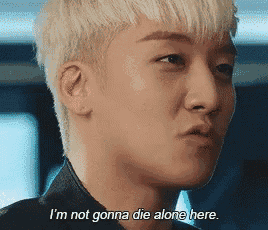 a man with blonde hair says i 'm not gonna die alone here .