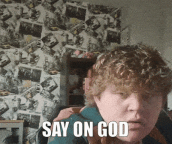 a young man with curly hair is making a funny face and saying say on god