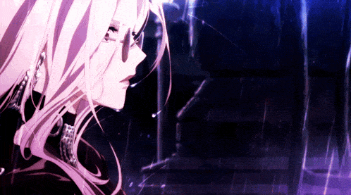 a close up of a girl 's face in the rain