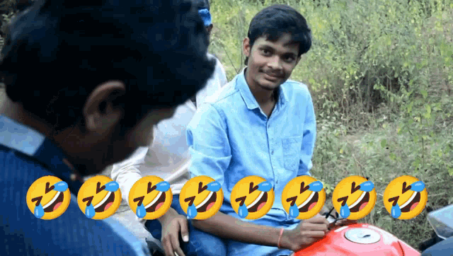 a man sitting on a motorcycle with a bunch of smiley faces on the bottom
