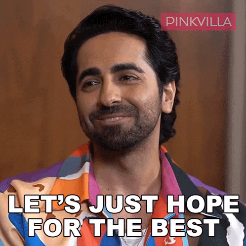 a man with a beard is smiling with the words let 's just hope for the best
