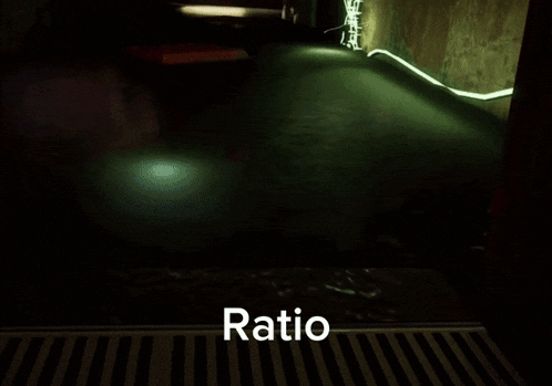 a dark room with the word ratio on the bottom