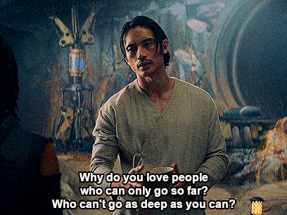 a man is holding a cup and talking to another man with a caption that says why do you love people