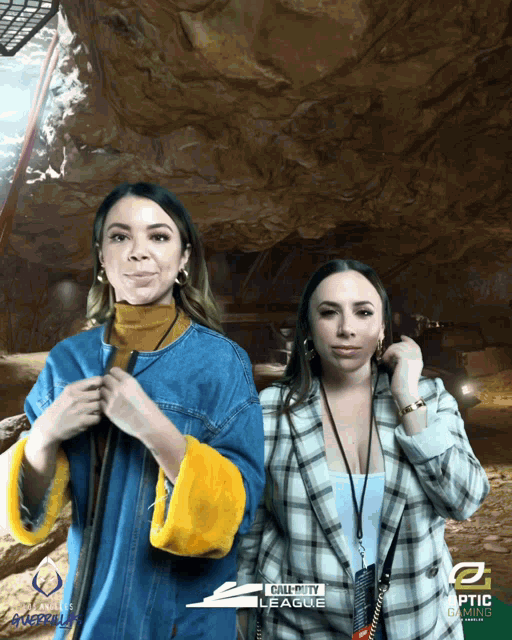two women are posing for a photo with a call of duty league logo