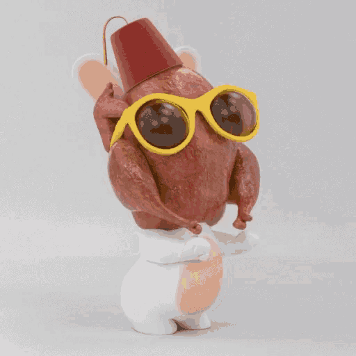 a figurine of a turkey wearing sunglasses and a hat