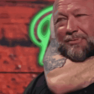 a man with a beard and a tattoo on his neck is standing in front of a green neon sign .