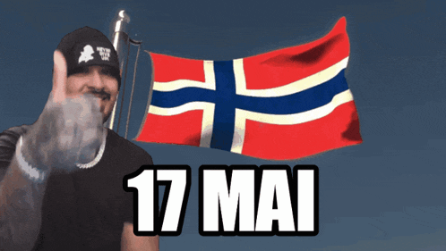 a man giving a thumbs up in front of a norwegian flag with the date 17 mai