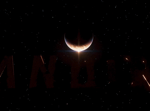 a dark background with the word andor written in copper letters