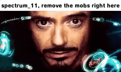 a close up of a man 's face with the words `` spectrum 11 , remove the mobs right here ''