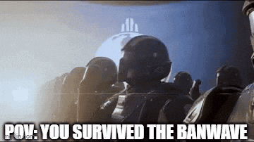 a group of soldiers are standing in a dark room with the words `` you survived the banwave '' .